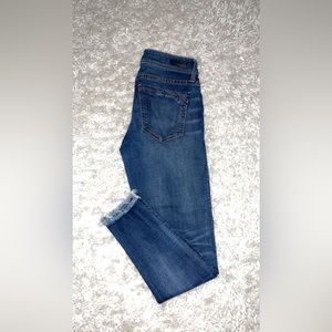 Buckle black skinny jeans
